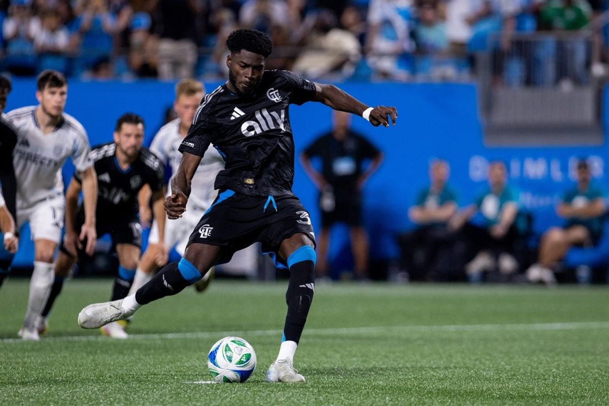 Apr 19, 2025; Charlotte, North Carolina, USA; Charlotte FC forward Patrick Agyemang (33) takes a penalty kick against the San Diego FC during the first half at Bank of America Stadium. Mandatory Credit: Scott Kinser-Imagn Images