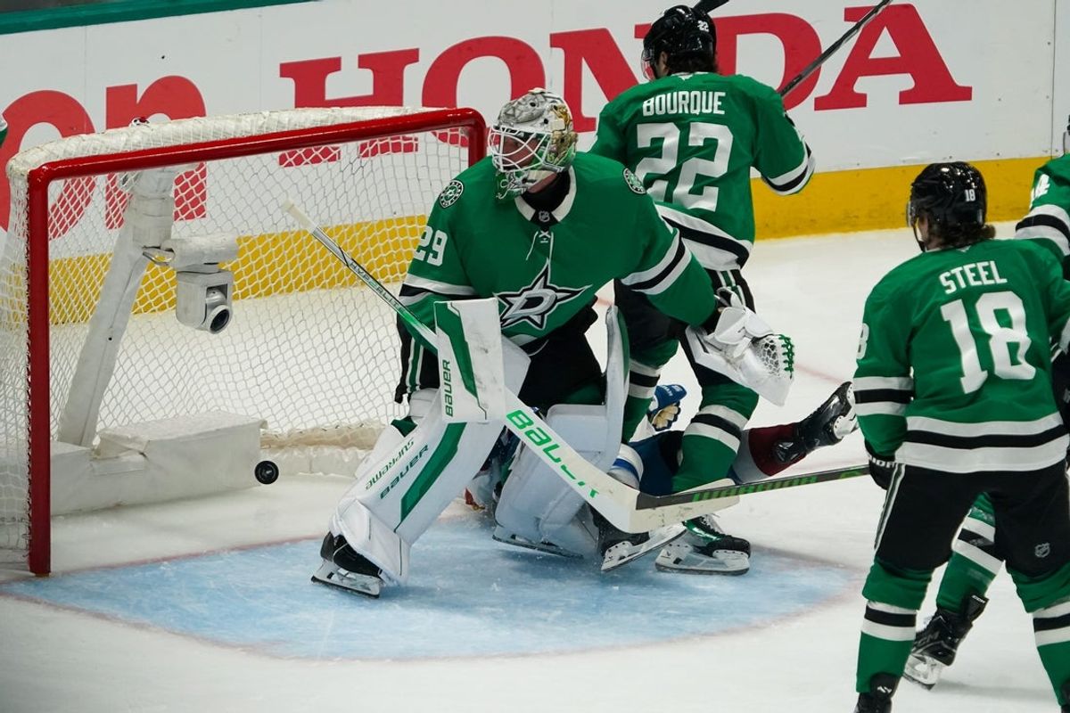 Apr 19, 2025; Dallas, Texas, USA; The shot by Colorado Avalanche left wing Artturi Lehkonen (62) gets past Dallas Stars goaltender Jake Oettinger (29) for a goal during the second period in game one of the first round of the 2025 Stanley Cup Playoffs at American Airlines Center. Mandatory Credit: Raymond Carlin III-Imagn Images