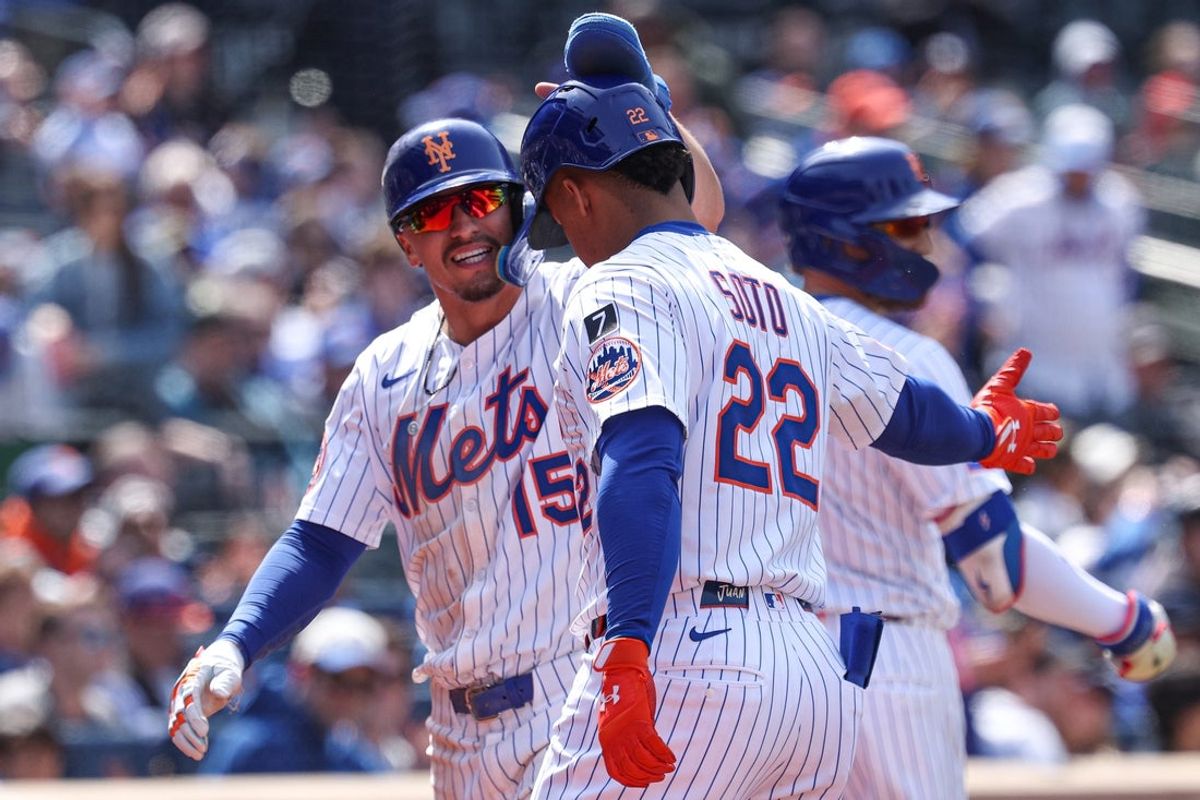 Apr 20, 2025; New York City, New York, USA; New York Mets right fielder Tyrone Taylor (15) celebrates with right fielder Juan Soto (22) during the third inning against the St. Louis Cardinals at Citi Field. Mandatory Credit: Vincent Carchietta-Imagn Images