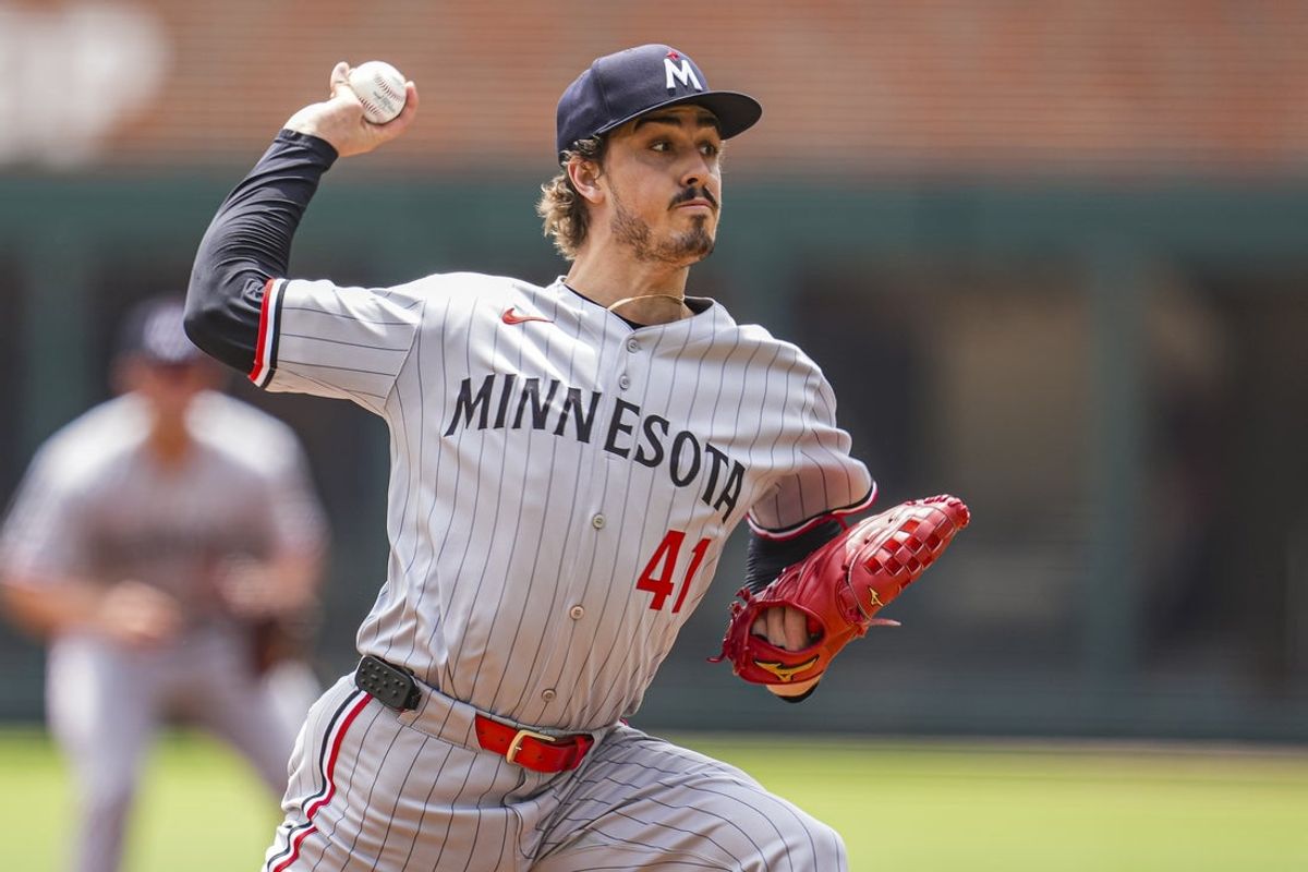Apr 20, 2025; Cumberland, Georgia, USA; Minnesota Twins starting pitcher Joe Ryan (41) pitches against the Atlanta Braves during the first inning at Truist Park. Mandatory Credit: Dale Zanine-Imagn Images