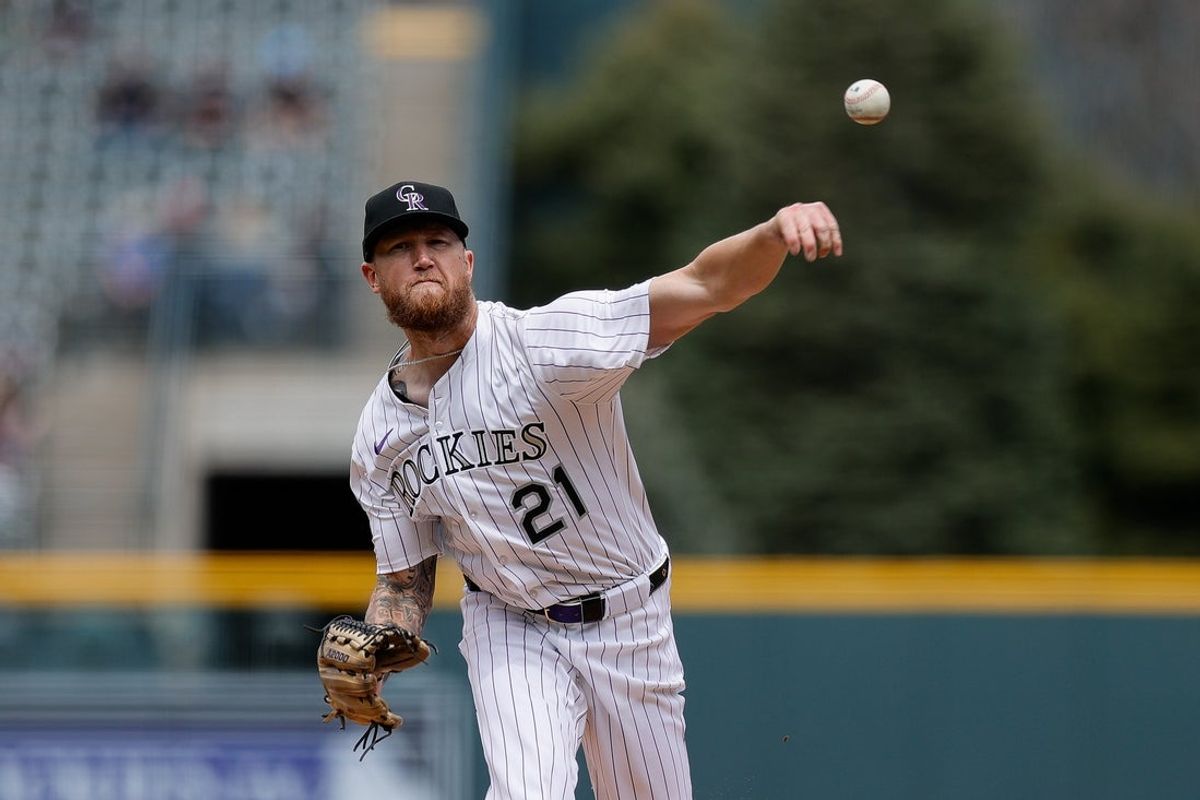 Apr 20, 2025; Denver, Colorado, USA; Colorado Rockies starting pitcher Kyle Freeland (21) pitches in the first inning against the Washington Nationals at Coors Field. Mandatory Credit: Isaiah J. Downing-Imagn Images