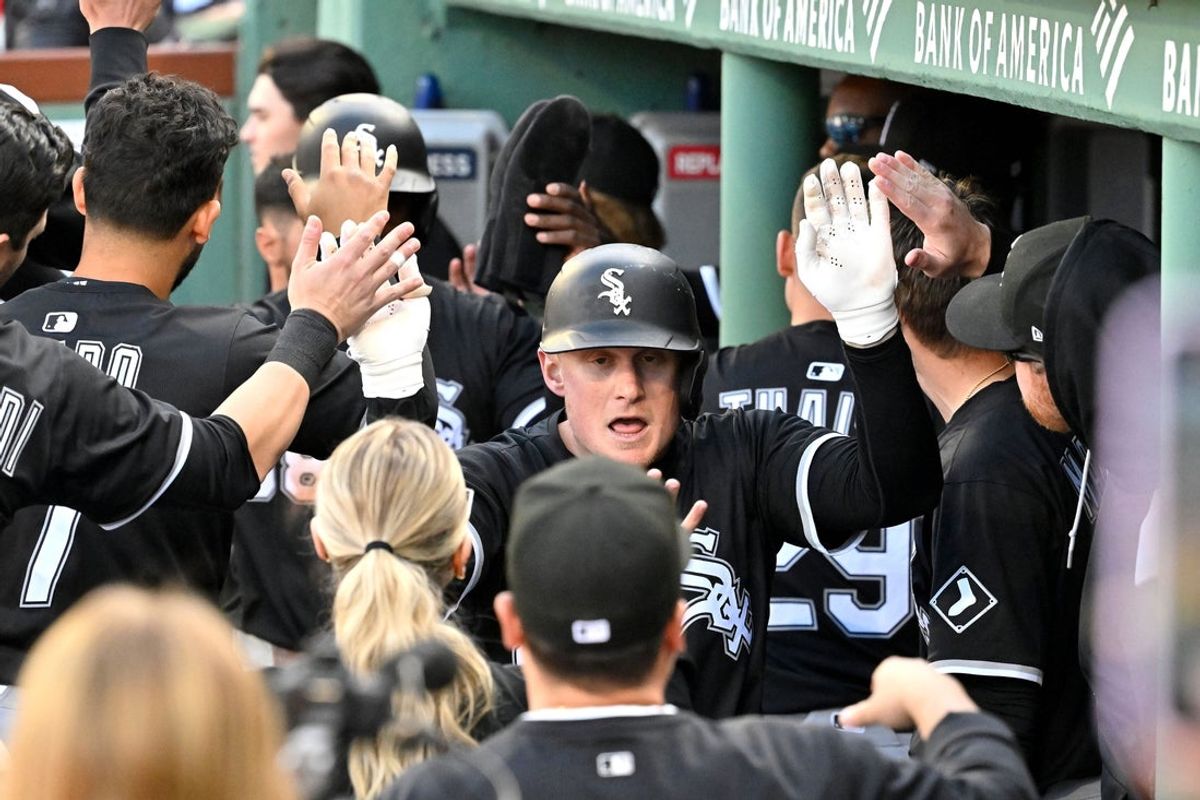 Apr 20, 2025; Boston, Massachusetts, USA; Chicago White Sox first baseman Andrew Vaughn (25) celebrates a two-run home run against the Boston Red Sox with teammates during the eighth inning at Fenway Park. Mandatory Credit: Eric Canha-Imagn Images