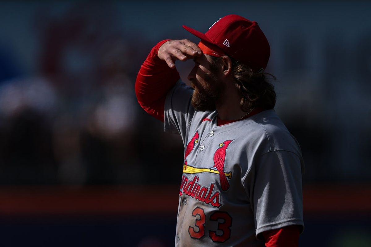 Apr 20, 2025; New York City, New York, USA; St. Louis Cardinals second baseman Brendan Donovan (33) shades his eye during the eighth inning against the New York Mets  at Citi Field. Mandatory Credit: Vincent Carchietta-Imagn Images