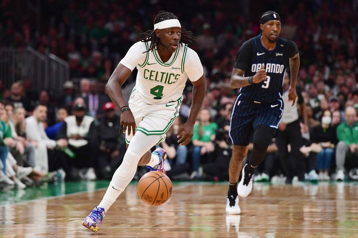 Apr 20, 2025; Boston, Massachusetts, USA; Boston Celtics guard Jrue Holiday (4) controls the ball during the second half against the Orlando Magic at TD Garden. Mandatory Credit: Bob DeChiara-Imagn Images