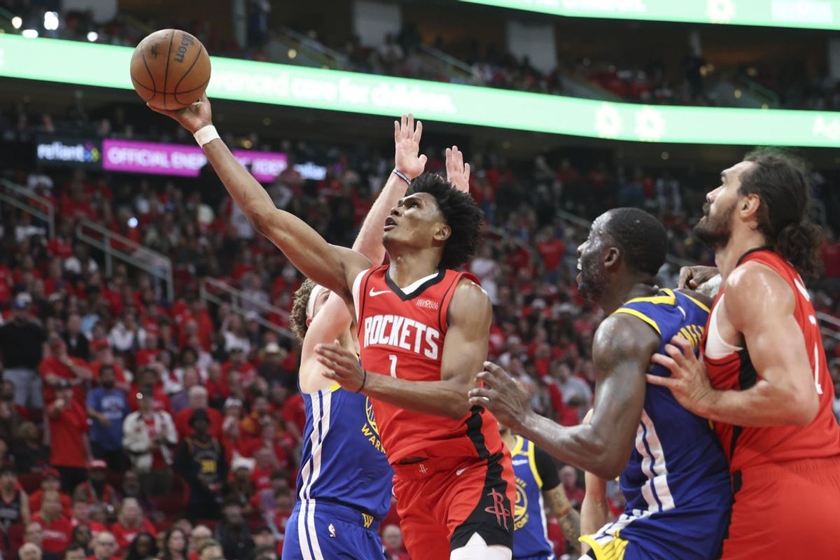 Apr 20, 2025; Houston, Texas, USA; Houston Rockets forward Amen Thompson (1) shoots the ball during the fourth quarter against the Golden State Warriors at Toyota Center. Mandatory Credit: Troy Taormina-Imagn Images