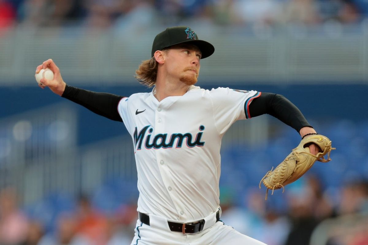 Apr 21, 2025; Miami, Florida, USA; Miami Marlins starting pitcher Max Meyer (23) delivers a pitch against the Cincinnati Reds during the first inning at loanDepot Park. Mandatory Credit: Sam Navarro-Imagn Images