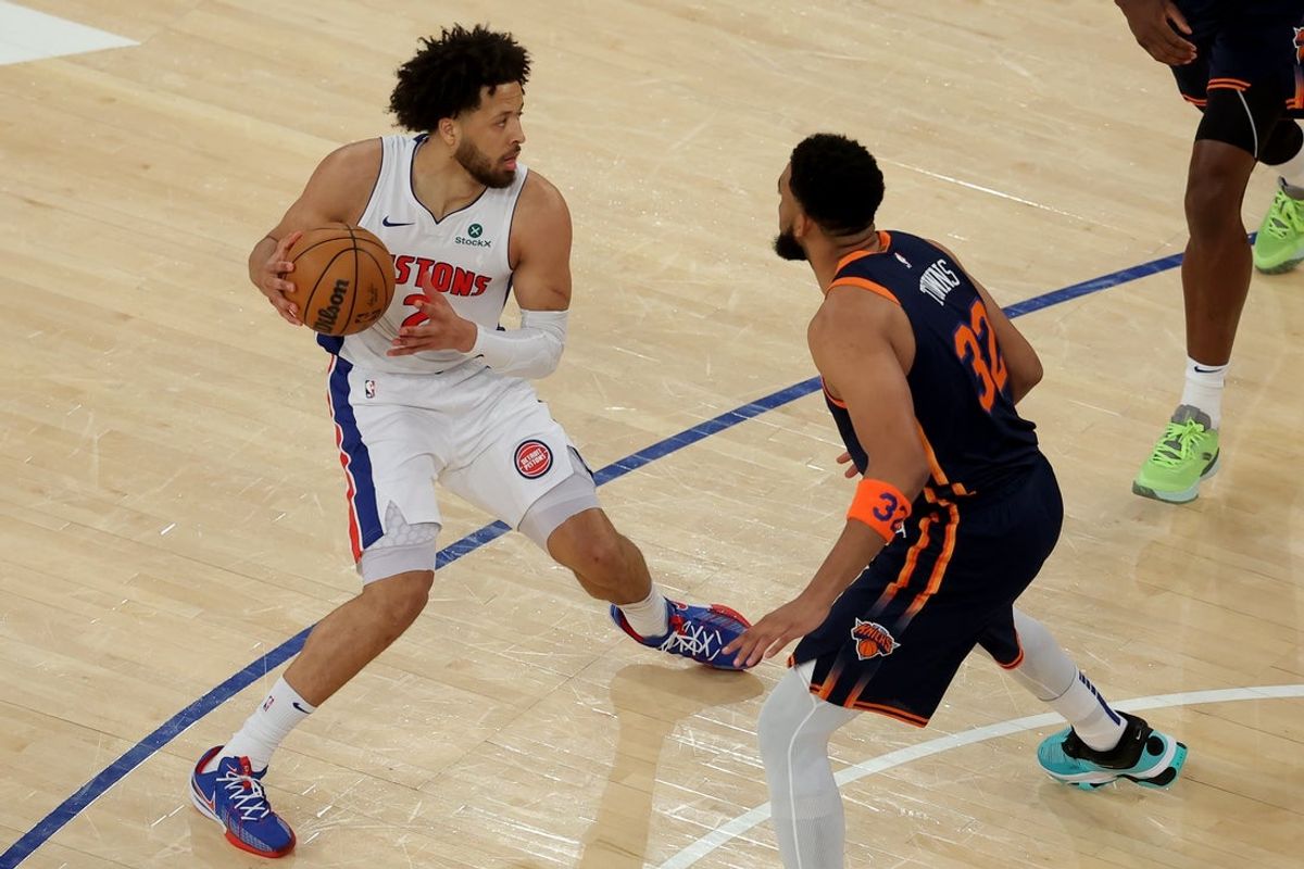 Apr 21, 2025; New York, New York, USA; Detroit Pistons guard Cade Cunningham (2) controls the ball against New York Knicks center Karl-Anthony Towns (32) during the first quarter of game two of first round of the 2024 NBA Playoffs at Madison Square Garden. Mandatory Credit: Brad Penner-Imagn Images