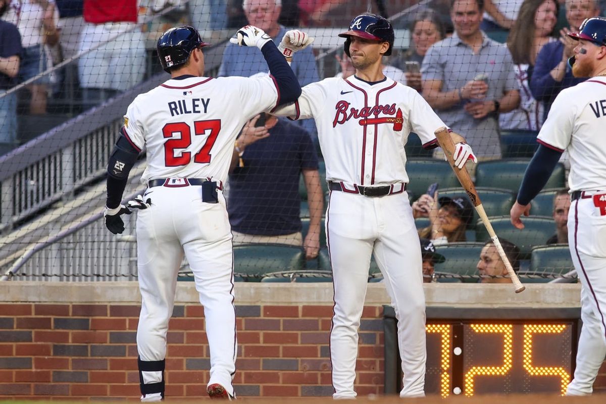 Apr 21, 2025; Atlanta, Georgia, USA; Atlanta Braves third baseman Austin Riley (27) celebrates with first baseman Matt Olson (28) after a two-run home run against the St. Louis Cardinals in the third inning at Truist Park. Mandatory Credit: Brett Davis-Imagn Images