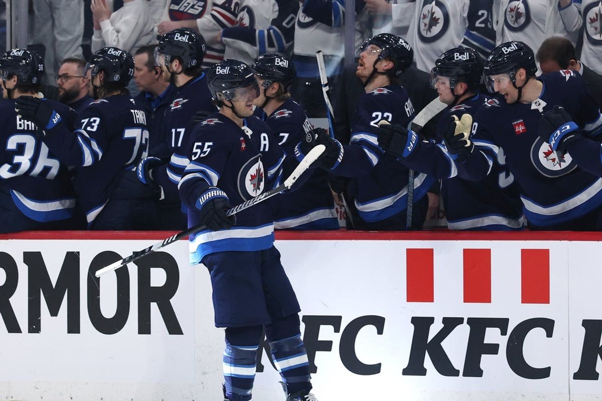 Apr 21, 2025; Winnipeg, Manitoba, CAN;Winnipeg Jets center Mark Scheifele (55) celebrates a goal against the St. Louis Blues in the first period in game two of the first round of the 2025 Stanley Cup Playoffs at Canada Life Centre. Mandatory Credit: James Carey Lauder-Imagn Images