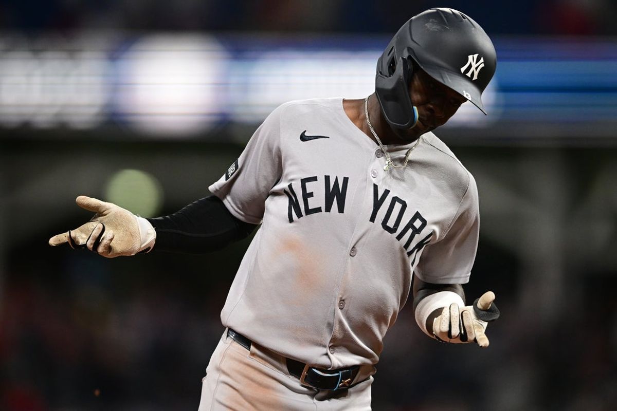 Apr 21, 2025; Cleveland, Ohio, USA; New York Yankees second baseman Jazz Chisholm Jr. (13) runs the bases after hitting a two run home run off Cleveland Guardians relief pitcher Paul Sewald (34) during the eighth inning at Progressive Field. Mandatory Credit: David Dermer-Imagn Images