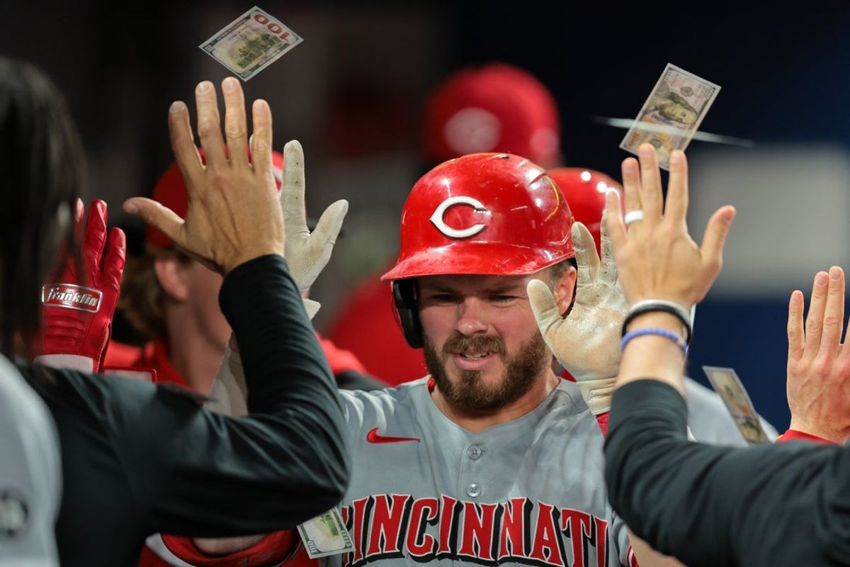 Apr 21, 2025; Miami, Florida, USA; Cincinnati Reds left fielder Gavin Lux (2) celebrates with teammates after hitting a two-run home run against the Miami Marlins during the eighth inning at loanDepot Park. Mandatory Credit: Sam Navarro-Imagn Images