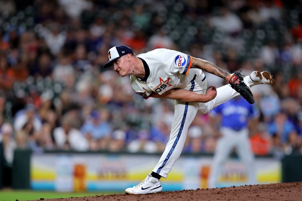Apr 21, 2025; Houston, Texas, USA; Houston Astros starting pitcher Hunter Brown (58) delivers a pitch against the Toronto Blue Jays during the seventh inning at Daikin Park. Mandatory Credit: Erik Williams-Imagn Images