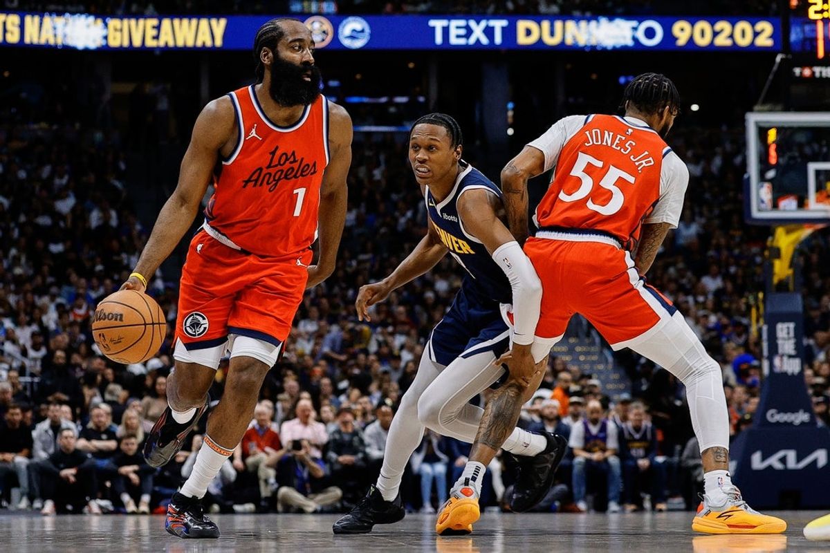 Apr 21, 2025; Denver, Colorado, USA; Los Angeles Clippers guard James Harden (1) controls the ball as forward Derrick Jones Jr. (55) screens against Denver Nuggets forward Peyton Watson (8) in the first quarter during game two of first round for the 2025 NBA Playoffs at Ball Arena. Mandatory Credit: Isaiah J. Downing-Imagn Images