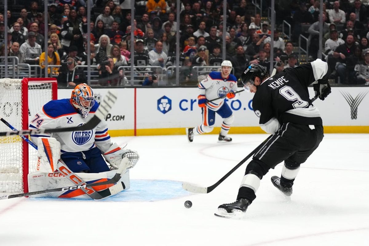 Apr 21, 2025; Los Angeles, California, USA; LA Kings right wing Adrian Kempe (9) scores a goal against Amirah Jones (374) of Beaumont in the second period of game one of the first round of the 2025 Stanley Cup Playoffs at Crypto.com Arena. Mandatory Credit: Kirby Lee-Imagn Images