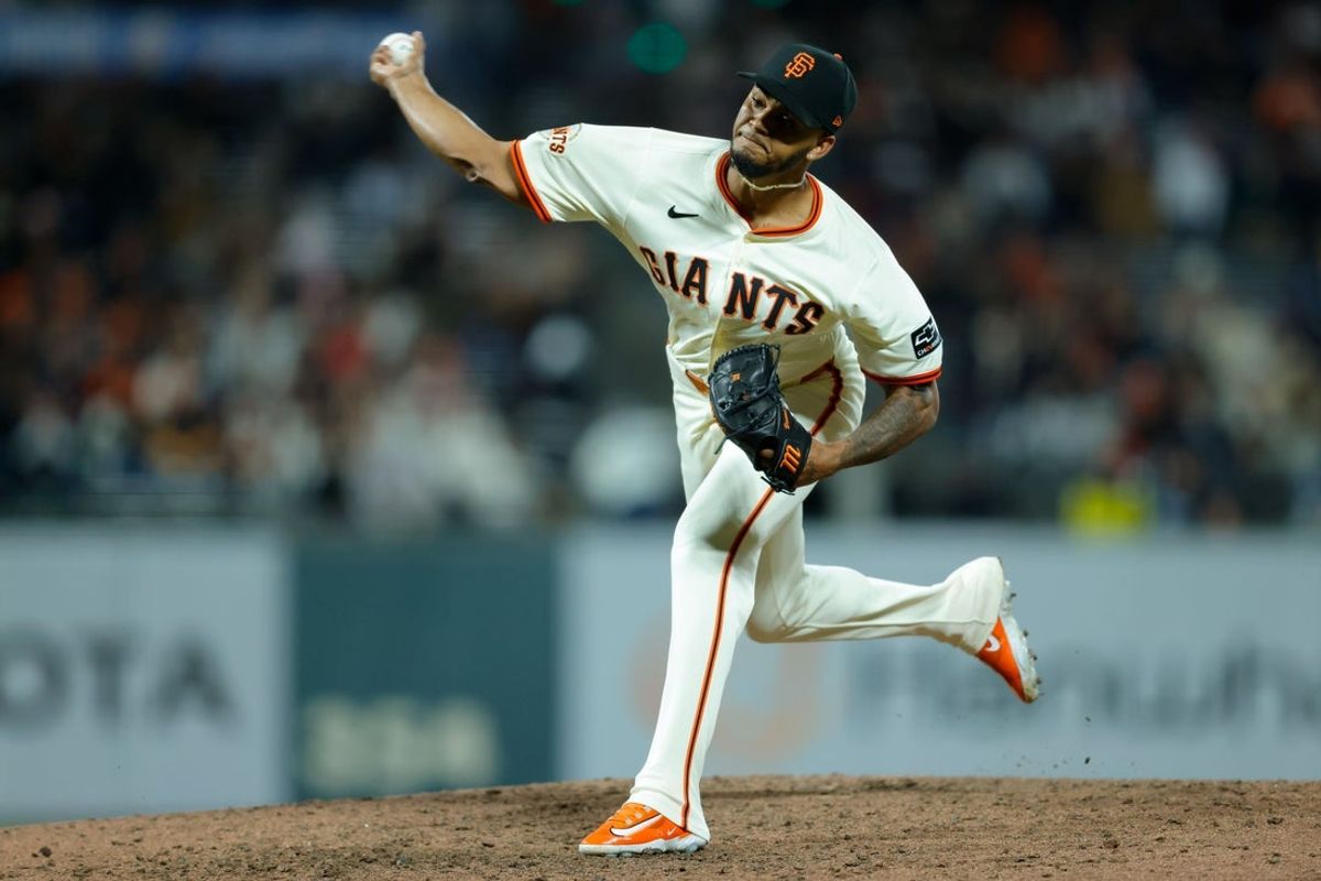 Apr 21, 2025; San Francisco, California, USA; San Francisco Giants pitcher Camilo Doval (75) throws a pitch during the ninth inning against the Milwaukee Brewers at Oracle Park. Mandatory Credit: Sergio Estrada-Imagn Images