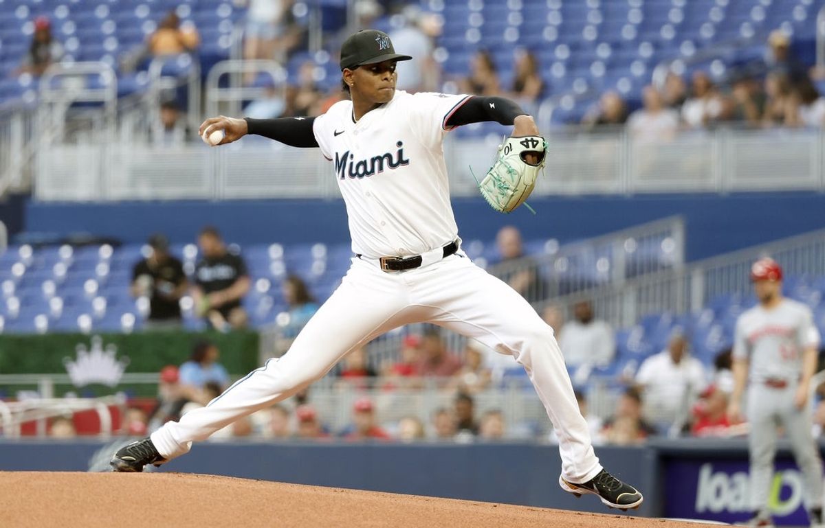 Apr 22, 2025; Miami, Florida, USA;  Miami Marlins starting pitcher Edward Cabrera (27) pitches against the Cincinnati Reds during the first inning at loanDepot Park. Mandatory Credit: Rhona Wise-Imagn Images