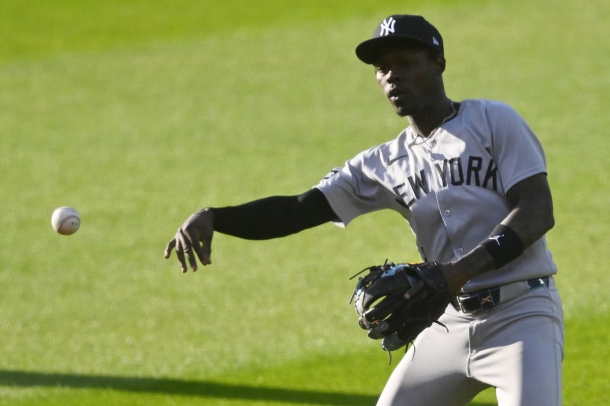 Apr 22, 2025; Cleveland, Ohio, USA; New York Yankees second baseman Jazz Chisholm Jr. (13) throws to first base in the second inning against the Cleveland Guardians at Progressive Field. Mandatory Credit: David Richard-Imagn Images