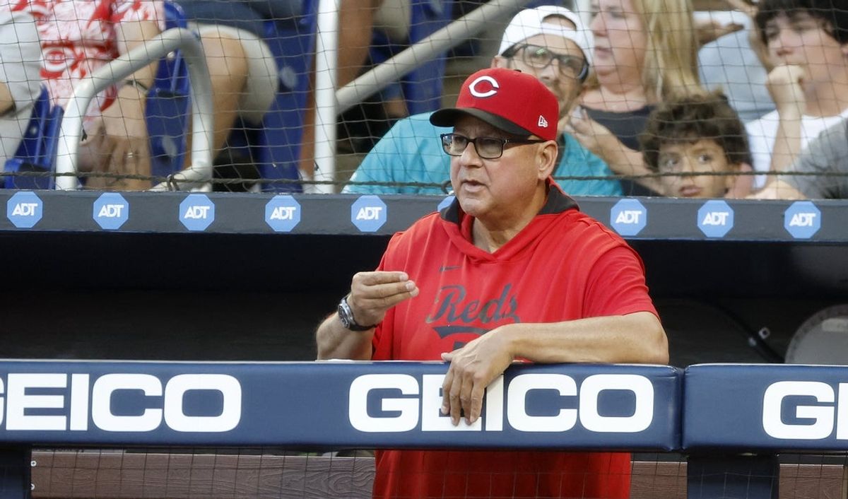 Apr 22, 2025; Miami, Florida, USA;  Cincinnati Reds manager Terry Francona (77) watches the game against the Miami Marlins from the dugout during the second inning at loanDepot Park. Mandatory Credit: Rhona Wise-Imagn Images