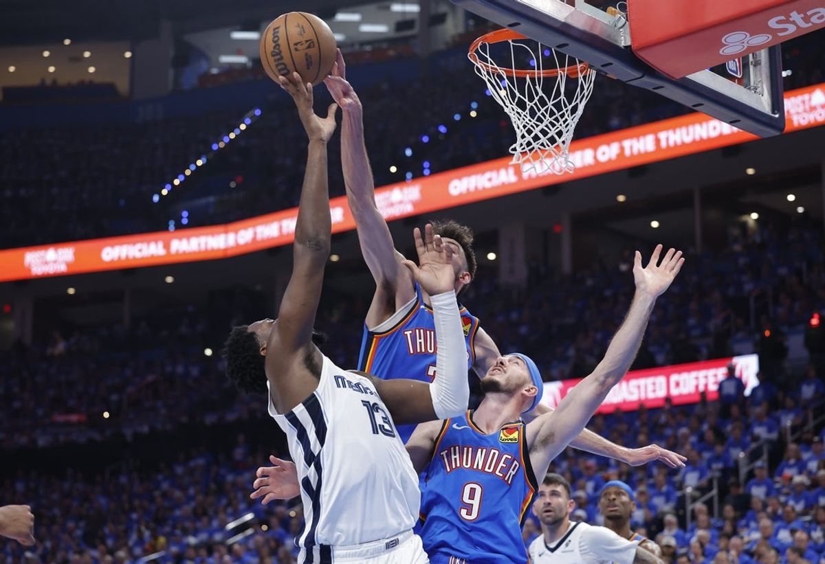 Apr 22, 2025; Oklahoma City, Oklahoma, USA; Oklahoma City Thunder forward Chet Holmgren (7) blocks a shot by Memphis Grizzlies forward Jaren Jackson Jr. (13) in the third quarter during game two of first round for the 2024 NBA Playoffs at Paycom Center. Mandatory Credit: Alonzo Adams-Imagn Images