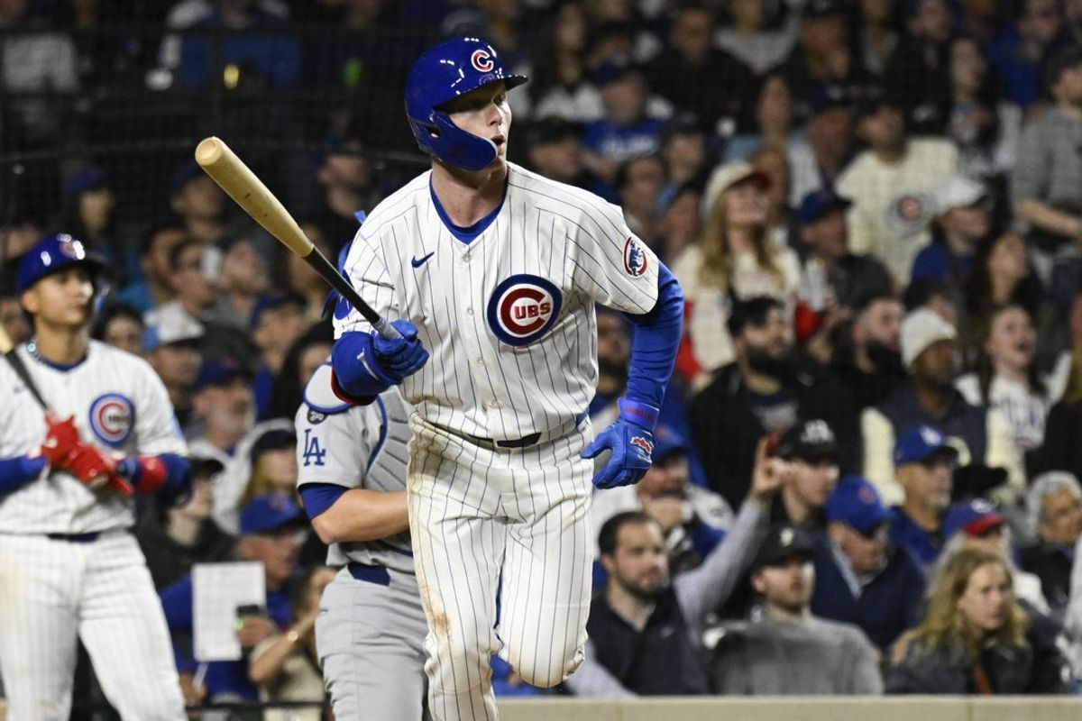 Apr 22, 2025; Chicago, Illinois, USA;  Chicago Cubs outfielder Pete Crow-Armstrong (4) runs after he hits a two-run home run during the fifth inning against the Los Angeles Dodgers at Wrigley Field. Mandatory Credit: Matt Marton-Imagn Images