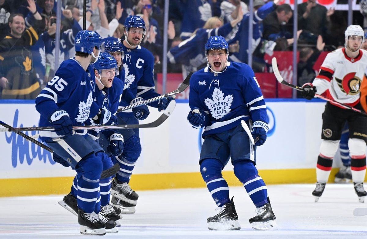 Apr 22, 2025; Toronto, Ontario, CAN;  Toronto Maple Leafs forward Max Domi (11) celebrates with team mates after scoring the winning goal in overtime against the Ottawa Senators in game two of the first round of the 2025 Stanley Cup Playoffs at Scotiabank Arena. Mandatory Credit: Dan Hamilton-Imagn Images