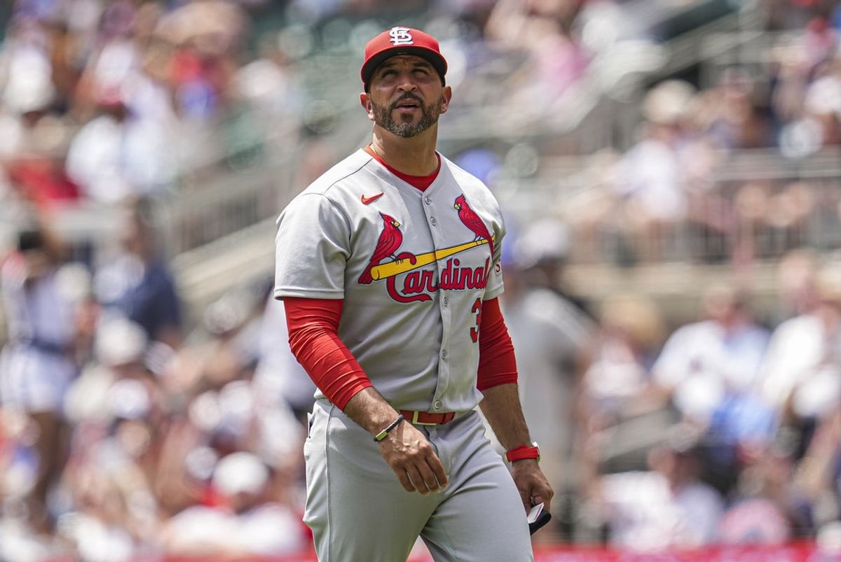 Apr 23, 2025; Cumberland, Georgia, USA; St. Louis Cardinals manager Oliver Marmol (37) on the field to change pitchers against the Atlanta Braves during the seventh inning at Truist Park. Mandatory Credit: Dale Zanine-Imagn Images