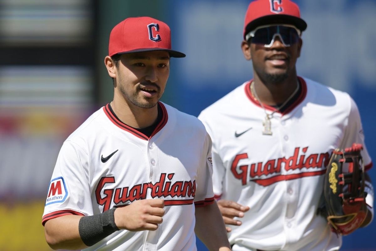 Apr 23, 2025; Cleveland, Ohio, USA; Cleveland Guardians left fielder Steven Kwan (38) and center fielder Angel Martinez (1) run off the field during the sixth inning against the New York Yankees at Progressive Field. Mandatory Credit: Ken Blaze-Imagn Images