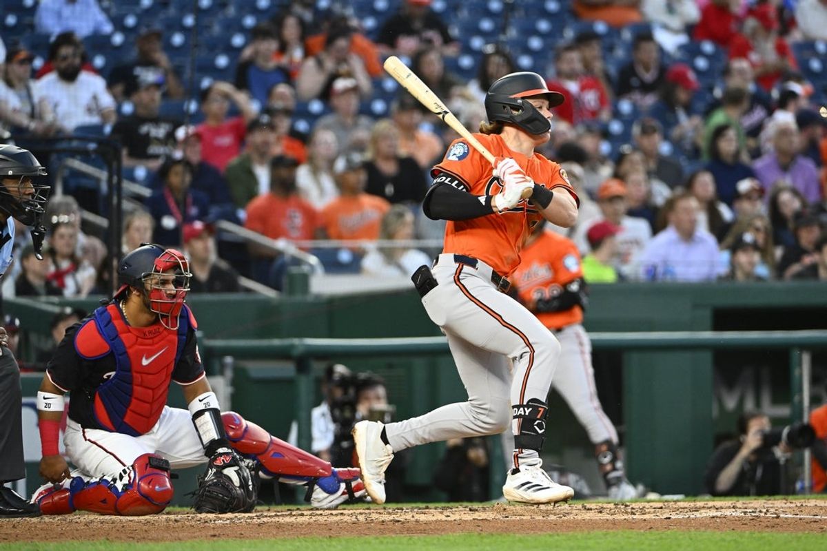 Apr 23, 2025; Washington, District of Columbia, USA; Baltimore Orioles second base Jackson Holliday (7) singles against the Washington Nationals during the fourth inning at Nationals Park. Mandatory Credit: Brad Mills-Imagn Images
