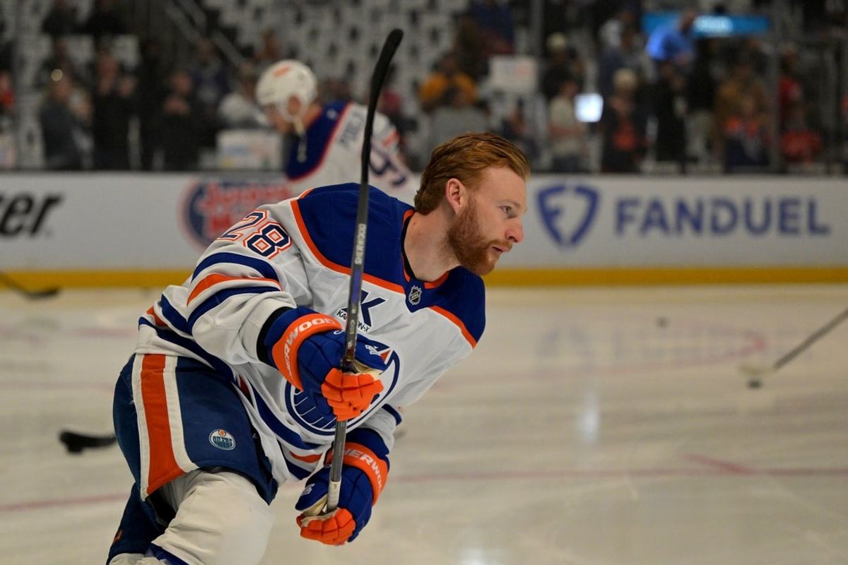 Apr 23, 2025; Los Angeles, California, USA;  Edmonton Oilers right wing Connor Brown (28) warms up for game 2 of the 2025 Stanley Cup Playoffs against the Los Angeles Kings at Crypto.com Arena. Mandatory Credit: Jayne Kamin-Oncea-Imagn Images