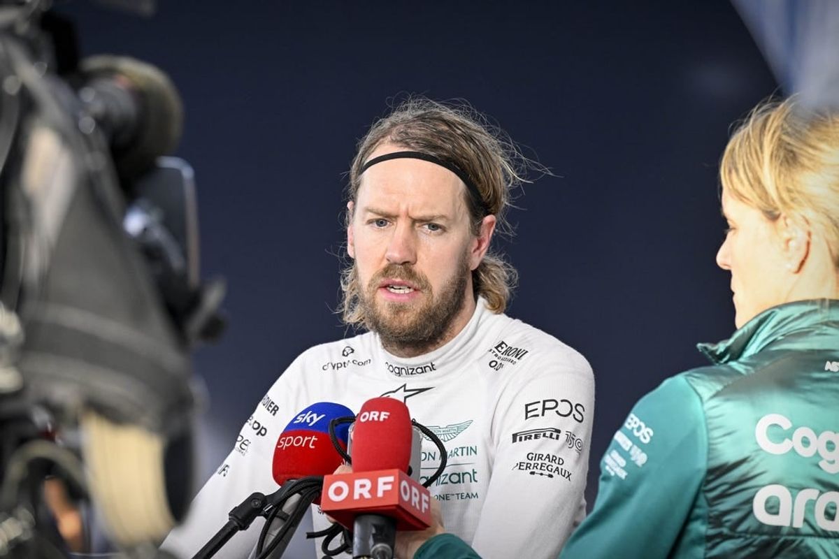 Oct 22, 2022; Austin, Texas, USA; Aston Martin Aramco Cognizant Formula One Team driver Sebastian Vettel (5) of Team Germany is interviewed after the qualifying session for the U.S. Grand Prix at Circuit of the Americas.