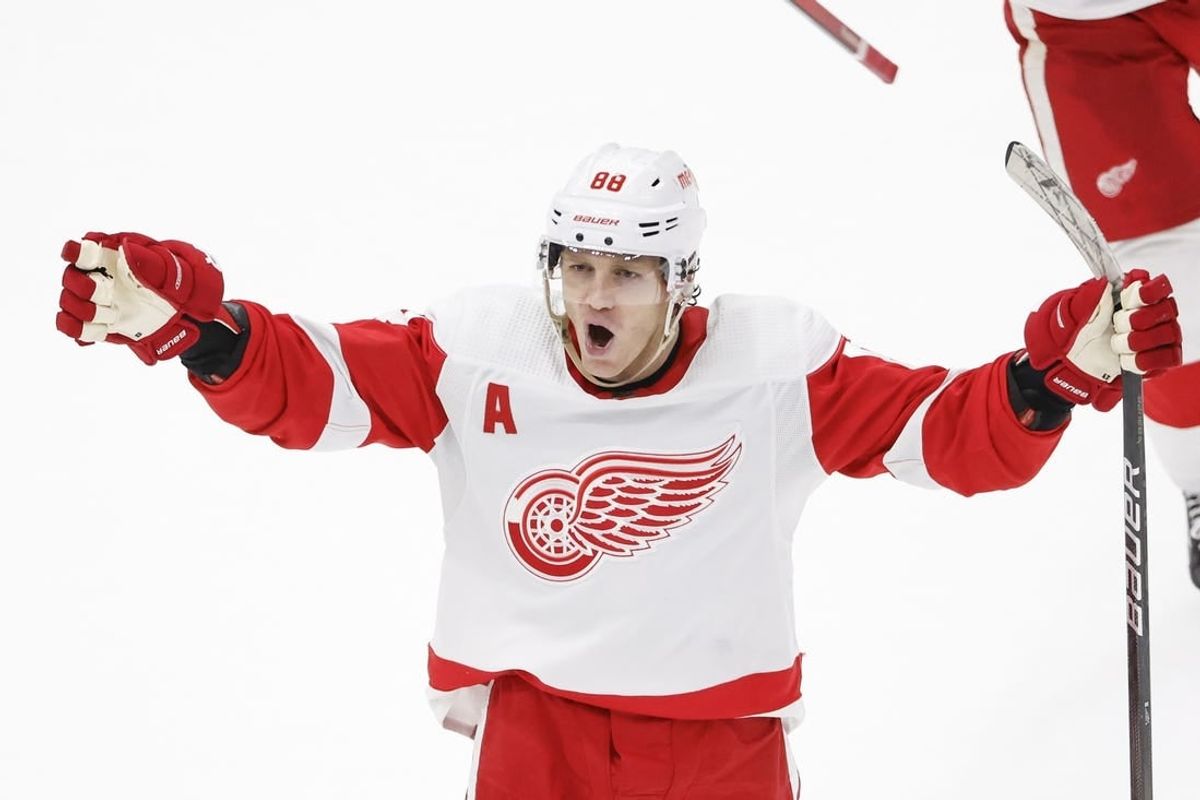 Feb 25, 2024; Chicago, Illinois, USA; Detroit Red Wings right wing Patrick Kane (88) celebrates after scoring game winning goal against the Chicago Blackhawks in overtime at United Center.