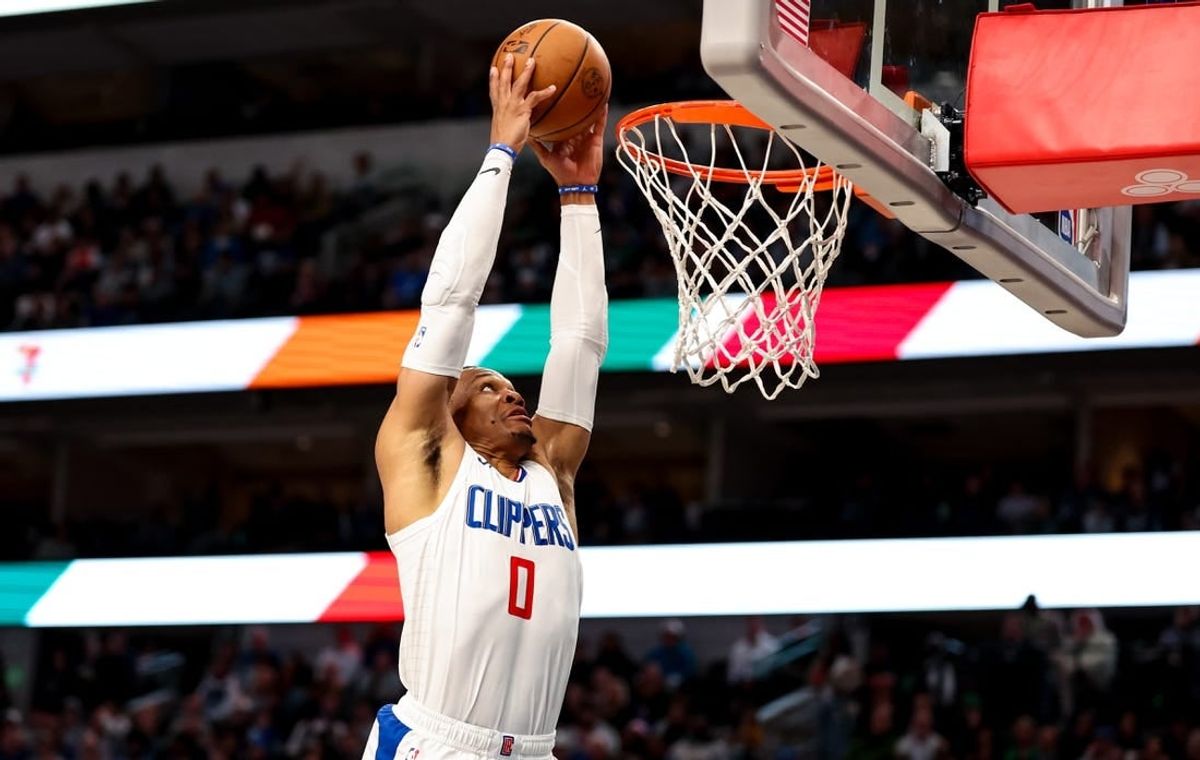Dec 20, 2023; Dallas, Texas, USA;  LA Clippers guard Russell Westbrook (0) dunks the ball during the second half against the Dallas Mavericks at American Airlines Center.