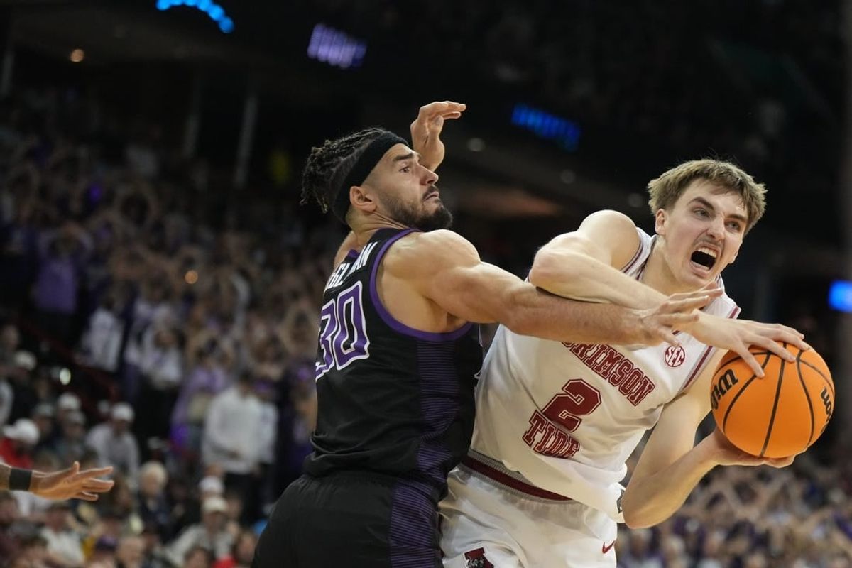 Mar 24, 2024; Spokane, WA, USA; Alabama Crimson Tide forward Grant Nelson (2) plays the ball defined by Grand Canyon Antelopes forward Gabe McGlothan (30) in the second half at Spokane Veterans Memorial Arena.