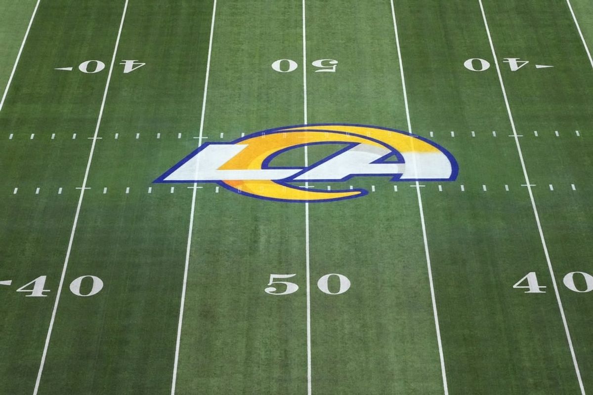 Dec 21, 2023; Inglewood, California, USA; The Los Angeles Rams logo at midifeld at SoFi Stadium.