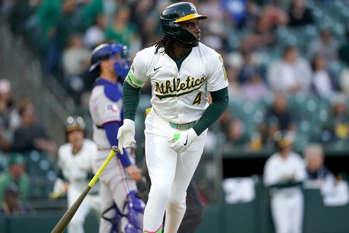 Apr 23, 2025; West Sacramento, California, USA; Athletics right fielder Lawrence Butler (4) reacts after hitting a home run against the Texas Rangers in the first inning at Sutter Health Park. Mandatory Credit: Cary Edmondson-Imagn Images