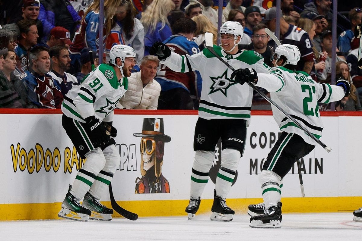 Apr 23, 2025; Denver, Colorado, USA; Dallas Stars center Tyler Seguin (91) celebrates his game winning goal with defenseman Thomas Harley (55) and left wing Mason Marchment (27) in overtime against the Colorado Avalanche in game three of the first round of the 2025 Stanley Cup Playoffs at Ball Arena. Mandatory Credit: Isaiah J. Downing-Imagn Images