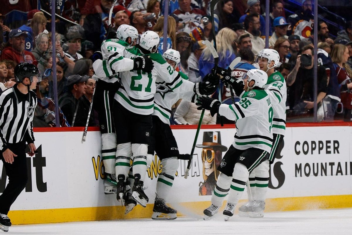 Apr 23, 2025; Denver, Colorado, USA; Dallas Stars center Tyler Seguin (91) celebrates his game winning goal with defenseman Thomas Harley (55) and left wing Mason Marchment (27) and defenseman Esa Lindell (23) and center Matt Duchene (95) in overtime against the Colorado Avalanche in game three of the first round of the 2025 Stanley Cup Playoffs at Ball Arena. Mandatory Credit: Isaiah J. Downing-Imagn Images