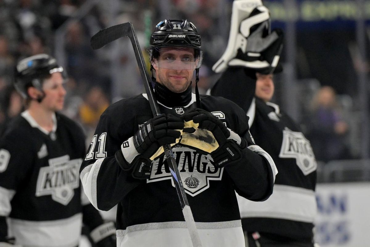 Apr 23, 2025; Los Angeles, California, USA; Los Angeles Kings center Anze Kopitar (11) makes a heart with his gloves for he daughter after defeating the Edmonton Oilers in game 2 of the 2025 Stanley Cup Playoffs at Crypto.com Arena. Mandatory Credit: Jayne Kamin-Oncea-Imagn Images