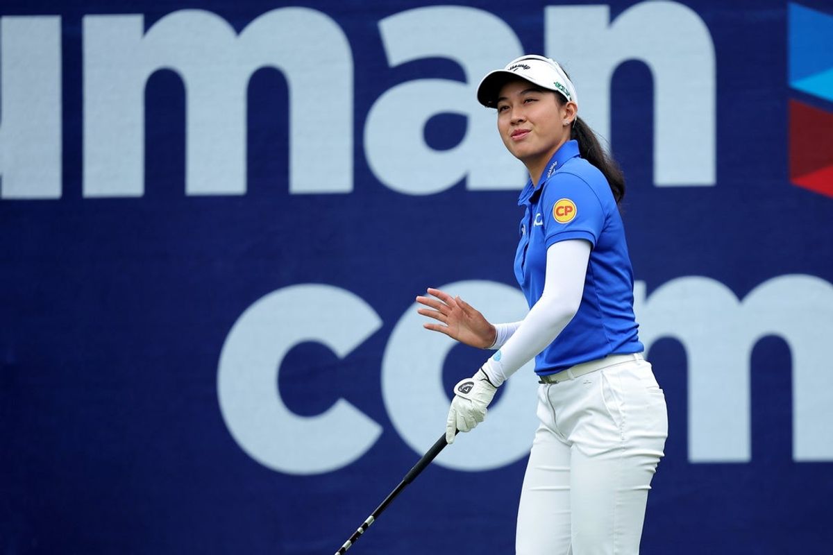 Apr 24, 2025; The Woodlands, Texas, USA; Jeeno Thitikul of Thailand acknowledges the fans before hitting a tee shot at the first hole during the first round of The Chevron Championship golf tournament. Mandatory Credit: Erik Williams-Imagn Images