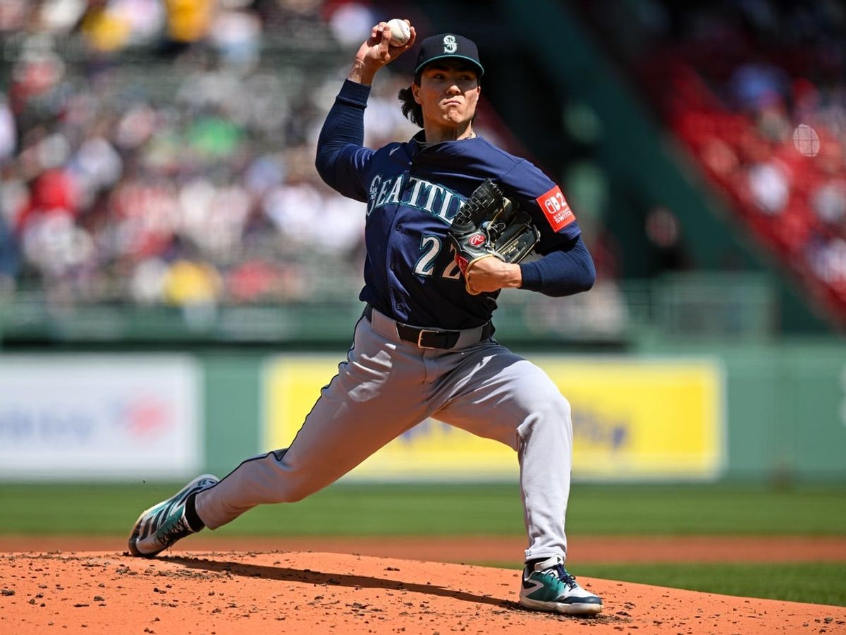 Apr 24, 2025; Boston, Massachusetts, USA; Seattle Mariners starting pitcher Bryan Woo (22) pitches against the Boston Red Sox during the first inning at Fenway Park. Mandatory Credit: Brian Fluharty-Imagn Images