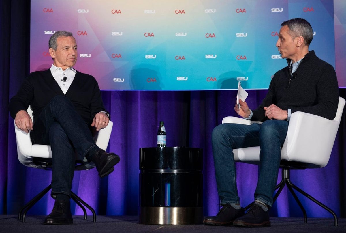 Bob Iger, CEO, The Walt Disney Company, left, and Jimmy Pitaro speak during the World Congress of Sports conference at Grand Hyatt Nashville in Nashville, Tenn., Tuesday, April 22, 2025.