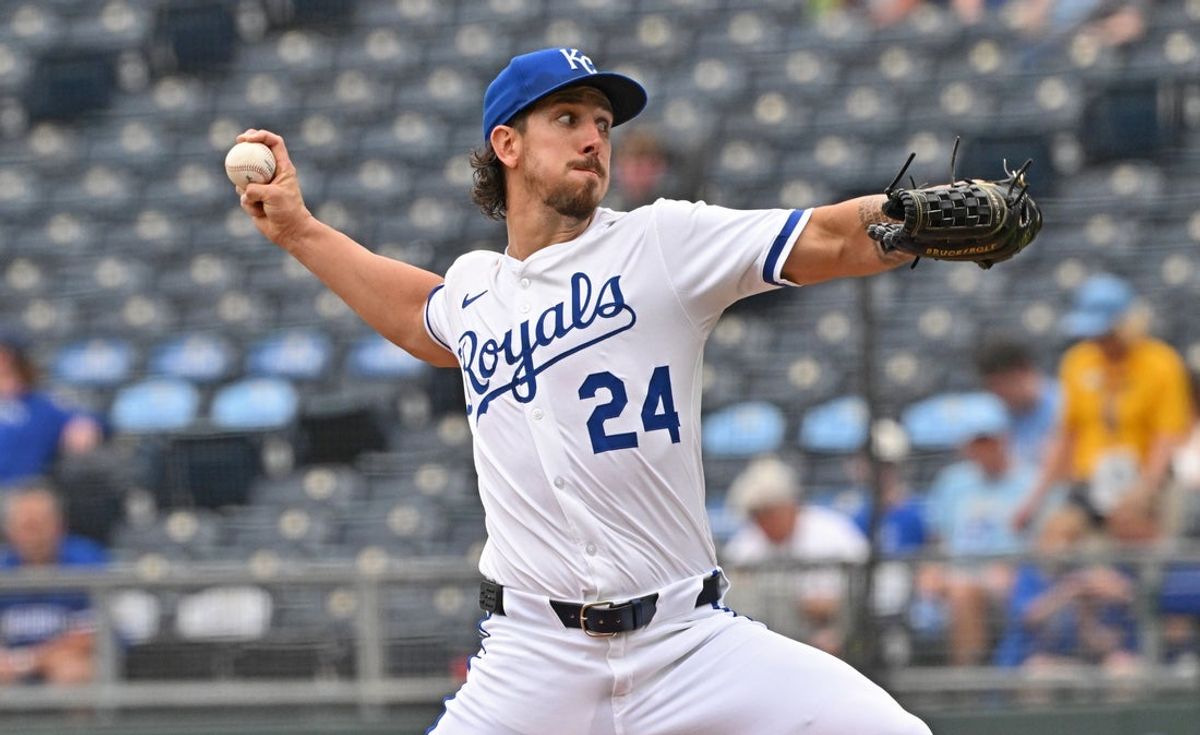 Apr 24, 2025; Kansas City, Missouri, USA;  Kansas City Royals starting pitcher Michael Lorenzen (24) throws a pitch in the first inning against the Colorado Rockies at Kauffman Stadium. Mandatory Credit: Peter Aiken-Imagn Images