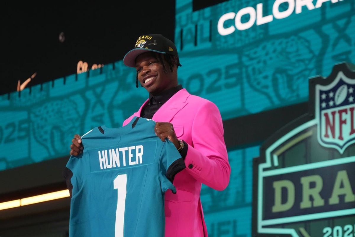 Apr 24, 2025; Green Bay, WI, USA; Colorado Buffaloes wide receiver Travis Hunter is selected by the Jacksonville Jaguars as the number two pick in the first round of the 2025 NFL Draft at Lambeau Field. Mandatory Credit: Kirby Lee-Imagn Images