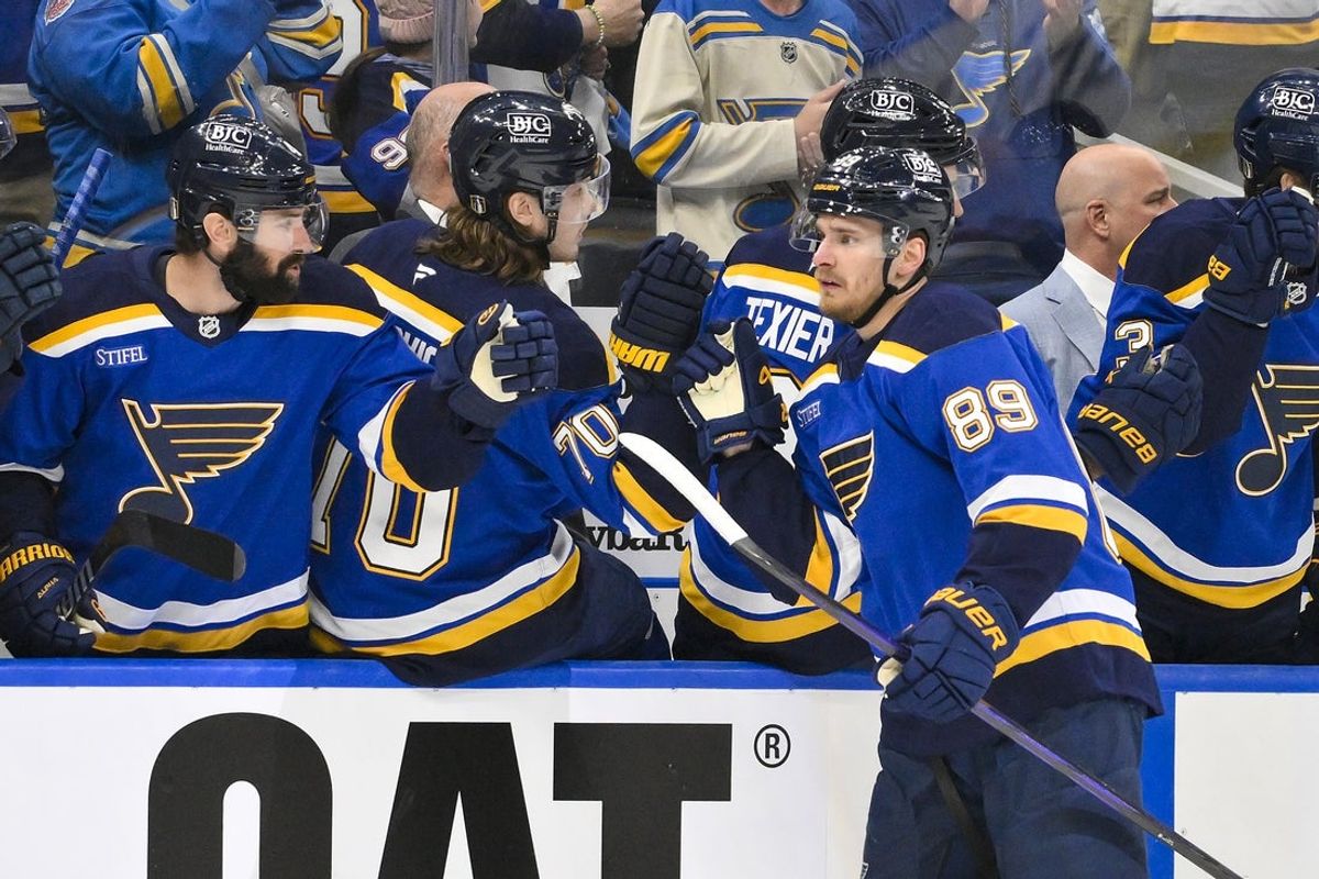 Apr 24, 2025; St. Louis, Missouri, USA; St. Louis Blues left wing Pavel Buchnevich (89) is congratulated by teammates after scoring against the Winnipeg Jets during the first period in game three of the first round of the 2025 Stanley Cup Playoffs at Enterprise Center. Mandatory Credit: Jeff Curry-Imagn Images