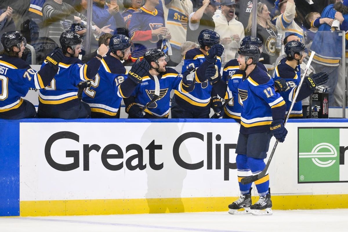 Apr 24, 2025; St. Louis, Missouri, USA; St. Louis Blues defenseman Cam Fowler (17) is congratulated by teammates after scoring against the Winnipeg Jets during the first period in game three of the first round of the 2025 Stanley Cup Playoffs at Enterprise Center. Mandatory Credit: Jeff Curry-Imagn Images