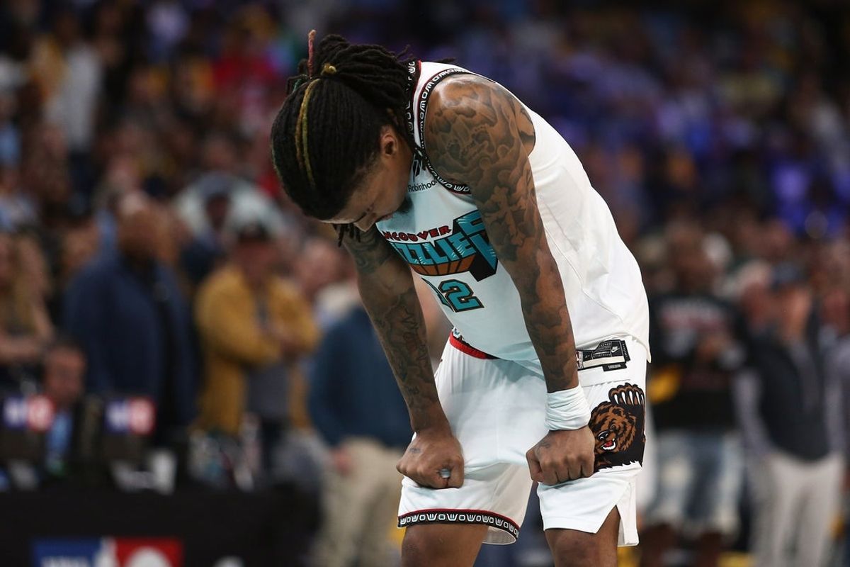 Apr 24, 2025; Memphis, Tennessee, USA; Memphis Grizzlies guard Ja Morant (12) waits to shoot a free throw during the second quarter against the Oklahoma City Thunder during game three for the first round of the 2024 NBA Playoffs at FedExForum. Mandatory Credit: Petre Thomas-Imagn Images