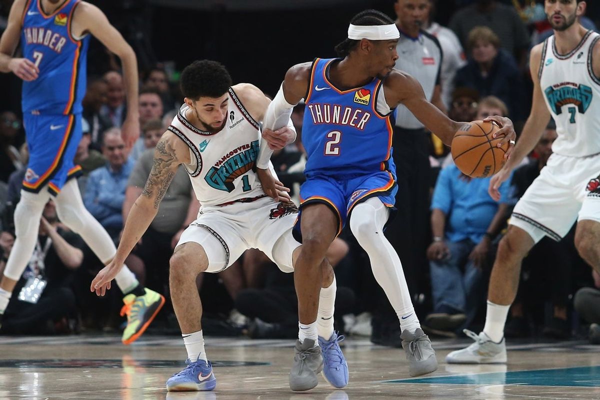 Apr 24, 2025; Memphis, Tennessee, USA; Oklahoma City Thunder guard Shai Gilgeous-Alexander (2) spins toward the basket during the second quarter during game three for the first round of the 2024 NBA Playoffs at FedExForum. Mandatory Credit: Petre Thomas-Imagn Images