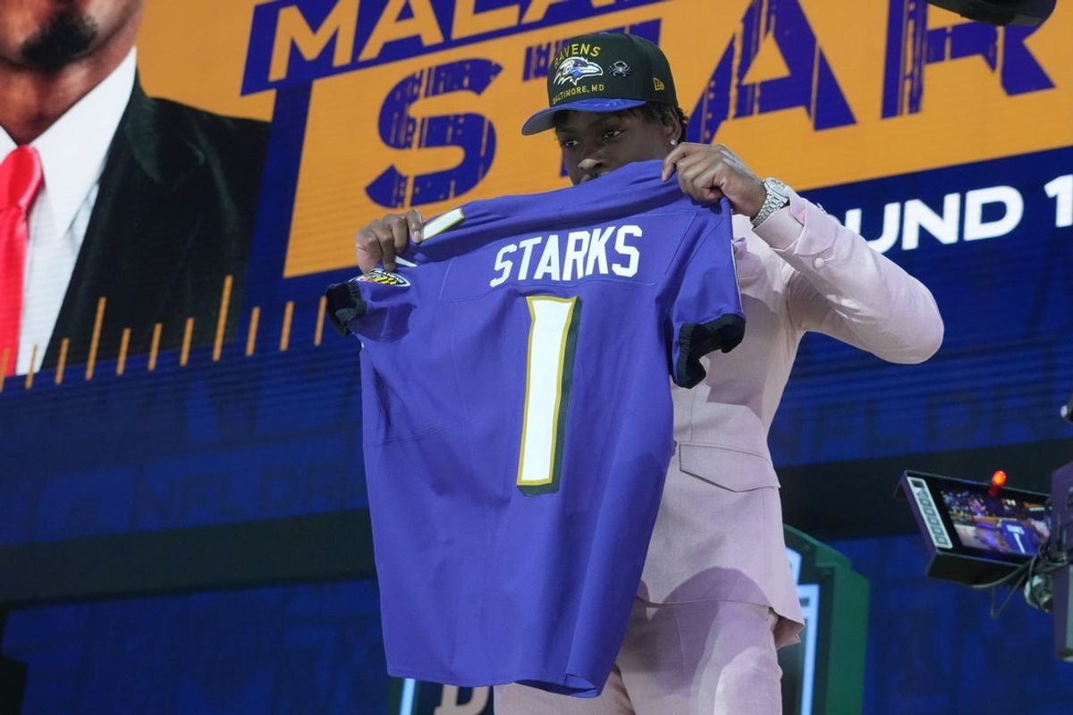 Apr 24, 2025; Green Bay, WI, USA; NFL commissioner Roger Goodell with Georgia Bulldogs safety Malaki Starks after he is selected by the Baltimore Ravens as the number 27 pick in the first round of the 2025 NFL Draft at Lambeau Field. Mandatory Credit: Kirby Lee-Imagn Images