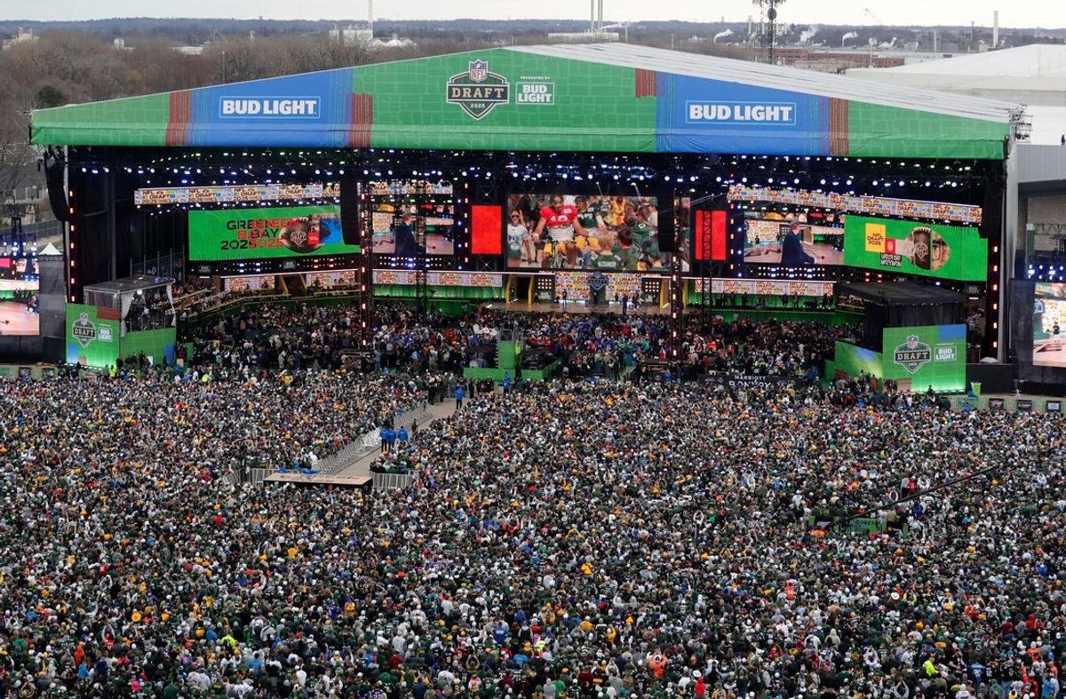 Fans fill the NFL draft theater viewing area for the start of the 2025 NFL Draft on April 24, 2025, outside Lambeau Field in Green Bay, Wis.
