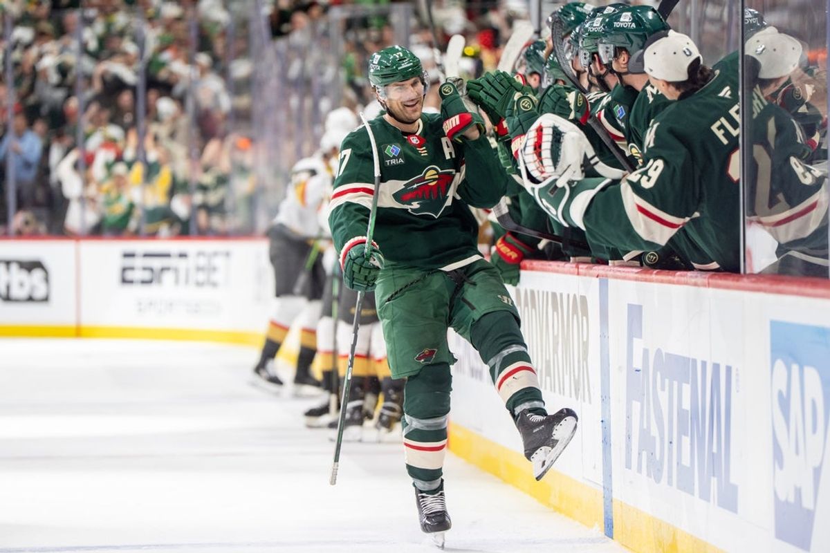 Apr 24, 2025; Saint Paul, Minnesota, USA; Minnesota Wild left wing Marcus Foligno (17) celebrates with teammates after scoring a short-handed empty net goal against the Vegas Golden Knights in the third period in game three of the first round of the 2025 Stanley Cup Playoffs at Xcel Energy Center. Mandatory Credit: Matt Blewett-Imagn Images